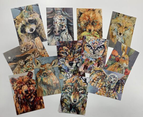 A set of 12 POSTCARDS ~ NEW! with a variety of animals on them.