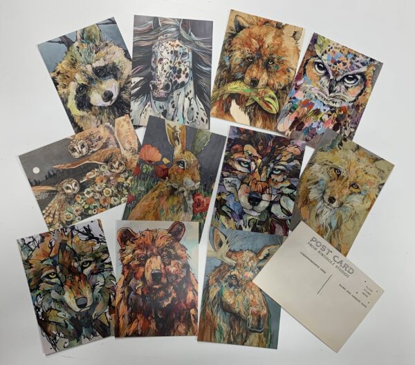 A 12 POSTCARDS ~ NEW! with animals on them.