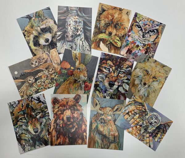 A set of 12 POSTCARDS ~ NEW! with different animals on them.