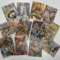 A set of 12 POSTCARDS ~ NEW! with different animals on them.