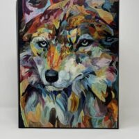 A LARGE JOURNAL - AUMAKUA with a painting of a wolf on a white background.