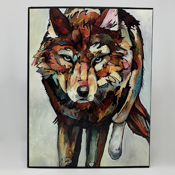 A LARGE JOURNAL - PURE HEART with a painting of a wolf with blue eyes.