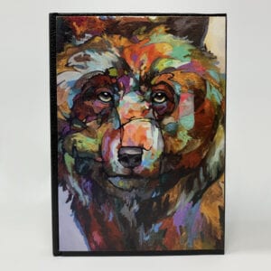 A colorful painting of a bear on a SMALL JOURNAL - STAY AWHILE.