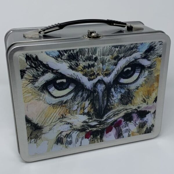 A paint box with an owl on it.