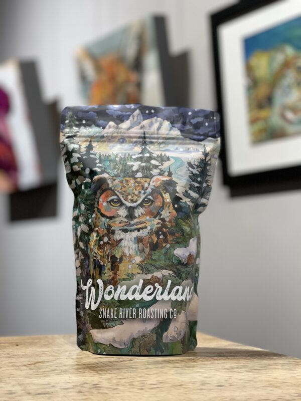 A bag of Wonderland Winter Coffee Blend sitting on a table.