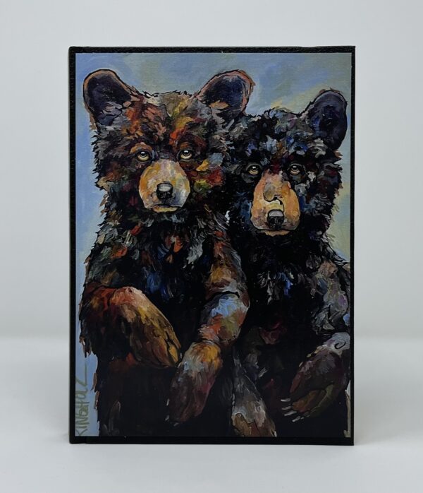 A SMALL JOURNAL - I'LL STAND BY YOU of two black bears in a frame.