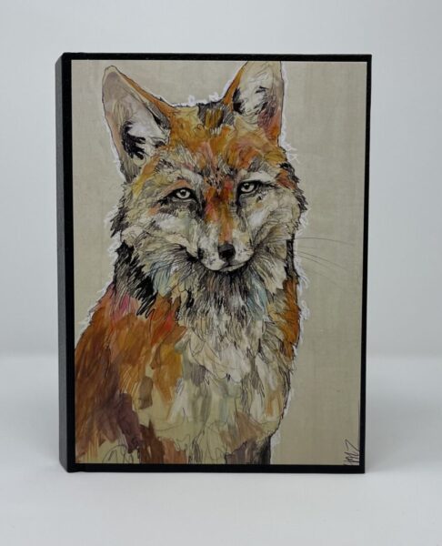 A SMALL JOURNAL - WILLING TO WAIT with a painting of a fox in a black frame.
