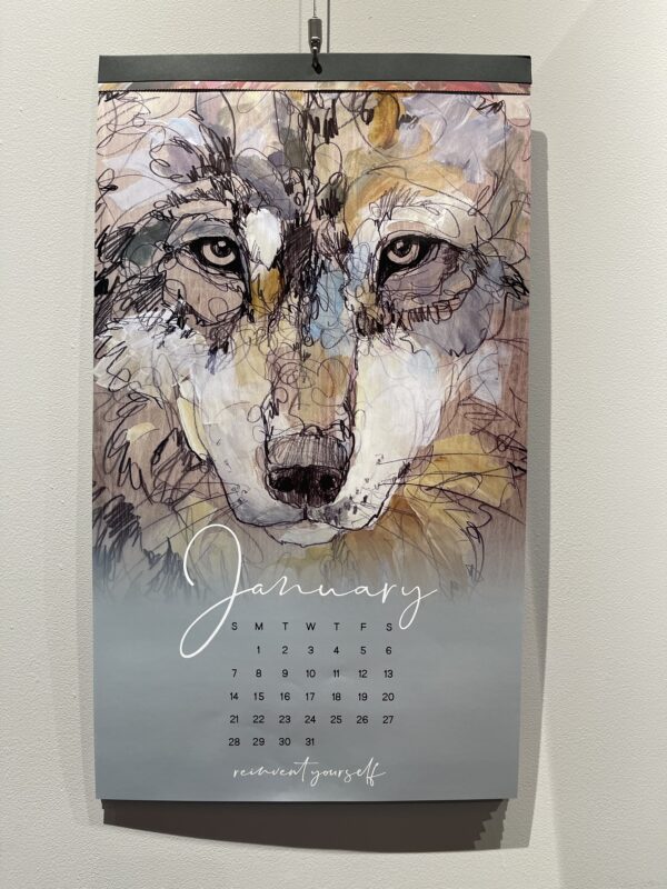 Ringholz Calendar 2024 for January featuring a watercolor illustration of a wolf.