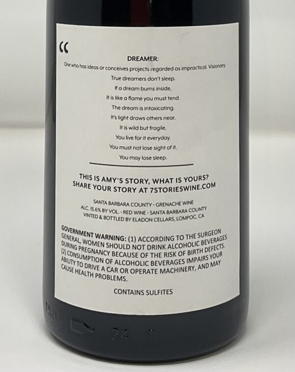 Wine bottle label with text about dreamer.